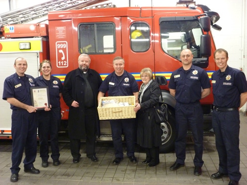 Watch Manager Colin Moran, Firefighter Emma McGregor, Father Daly, Kitty Holland, Firefighter Andy Doel and Firefighter Mike Wilkinson