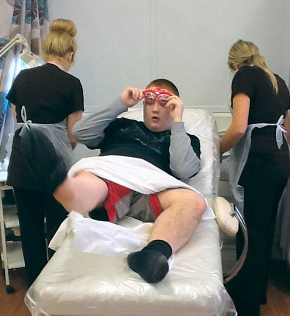 Hopwood's Ryan Rowson having his legs waxed for charity