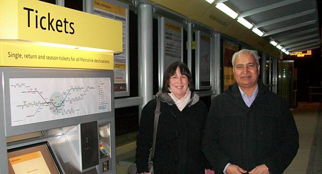 Christine Mathewson and Ghulam Rasul Shahzad OBE boarding the first Metrolink leaving Rochdale for Manchester on Thursday 28 February, 2013