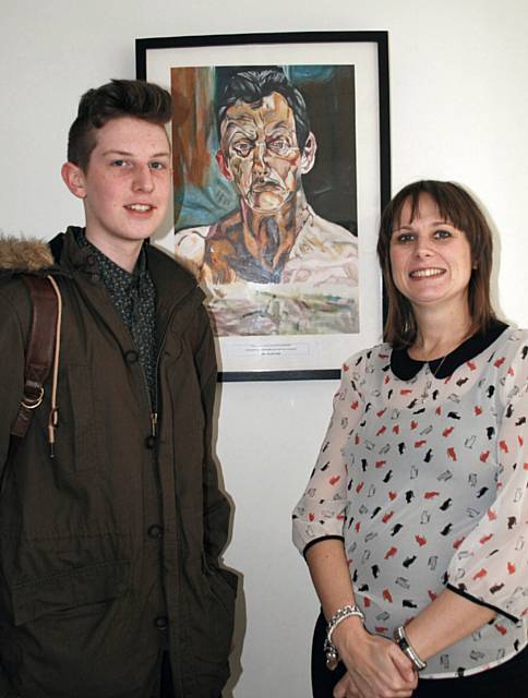 Luke McDaid, a first year fine art student at Hopwood Hall College with his copy of a Lucian Freud self portrait, and Yvonne Hall 