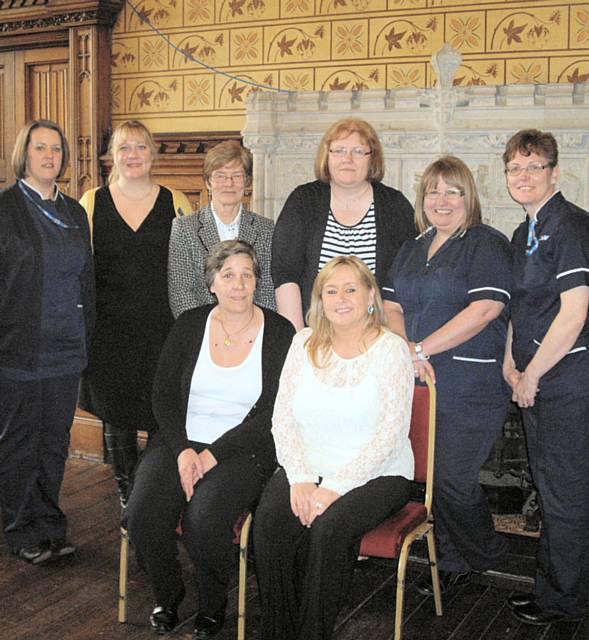 Gilly Keogh with care home managers Charlotte Goodwin, Chris Taylor, Sally Smedley, Christine Baines, Pauline McManus, Carol Young and Gail Gallagher