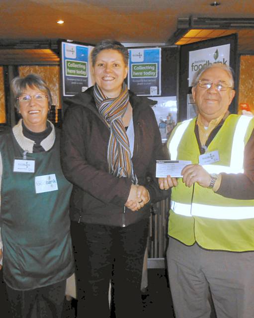 Louise Livesey, Learner Participation Officer at Hopwood Hall College presented a cheque to Iain and Margaret Wight from Rochdale Foodbank