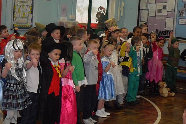 Year one and two pupils performing nursery rhymes in front of parents