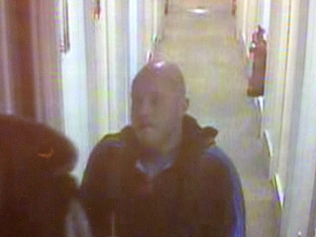 Detectives have released CCTV stills of two men they want to speak to in connection with a car theft at a hotel in St Helens