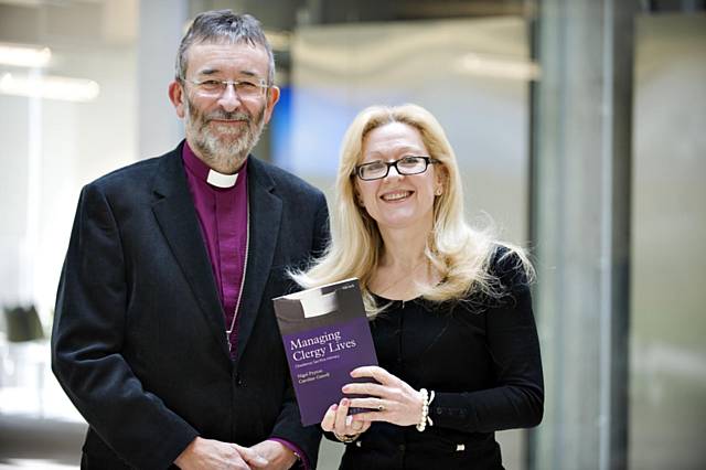 The Bishop, the Rt Rev Dr Nigel Peyton and Dr Caroline Gatrell of Lancaster University Management School 