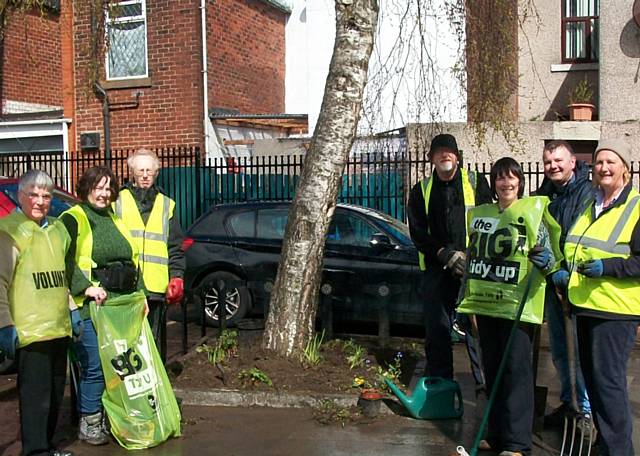 Rochdale Environment cleaned, cut the bushes and weeds on Henry Street and planted flowers