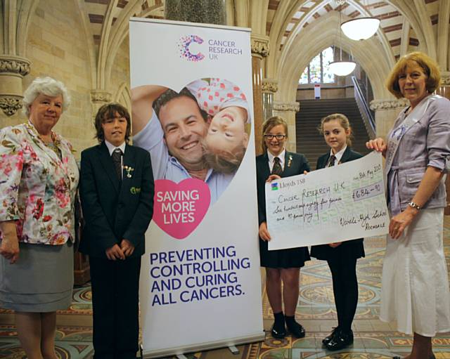 Pupils from Wardle High School attended a Cancer Research UK coffee morning at Rochdale Town Hall to present a cheque for £684.90 to the Mayoress, Mrs Jane Gartside and Kath Hazlehurst, Chair of Rochdale Cancer Research