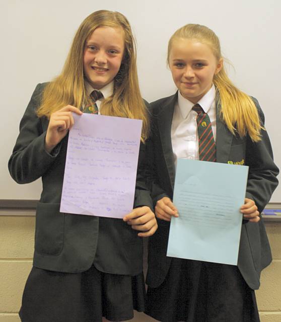 Year 7 Wardle High School students with letters for their pen pals in Colegio Compañía de María de Vigo in Pontevedra, Northern Spain