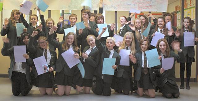 Year 7 Wardle High School students with letters for their pen pals in Colegio Compañía de María de Vigo in Pontevedra, Northern Spain