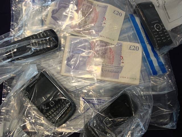 Officers discovered Class A drugs, believed to be cocaine, with the estimated  street value of £15,000, money and mobile phones