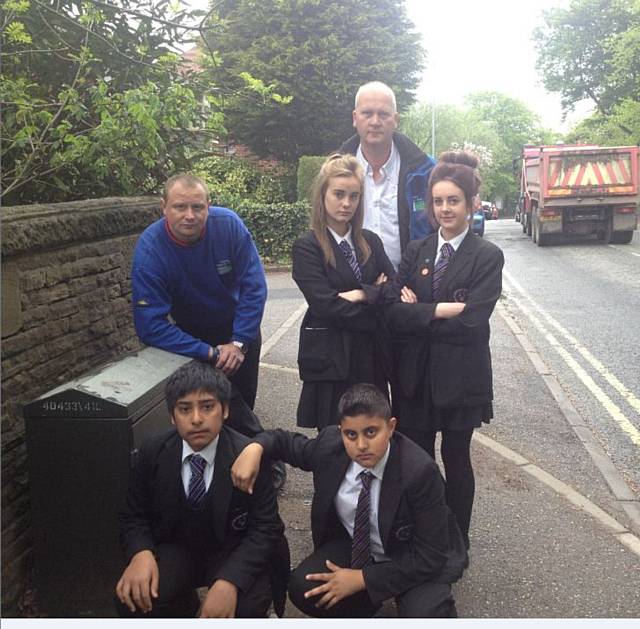 Casualty Reduction Officers Dave Godley and Stuart Howarth with Falinge Park High School pupils Siraj Shafique, Saxon Newsham, Georgia Lees and Asim Nadeem