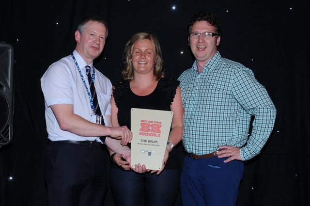 Andy Glover presents Best Pub award to The Baum owners Simon and Heidi Crompton in June 2013
