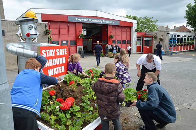 Heywood firefighters are saying it with flowers when it comes to water safety
