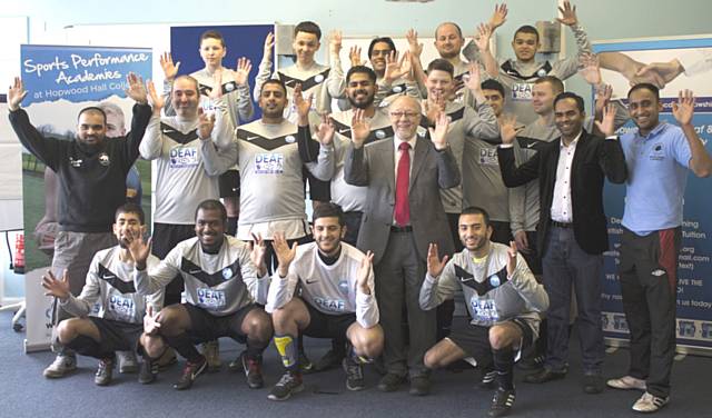 Deaf Rhinos FC team picture with manger and former Hopwood Hall student Rukon Rahman (far left), MP Jim Dobbin (centre) and Hopwood Hall Football Development Officer Dewan Choudhury (far right)