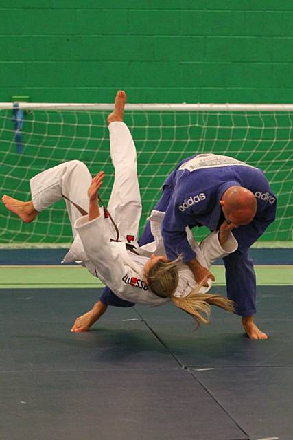 Sensei Simon Jackson performing a throwing technique 
