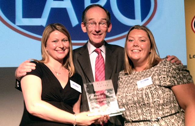 Makin Dixon partners Caroline Makin (left) and Jane Campbell receive the award from Lord Justice McFarlane