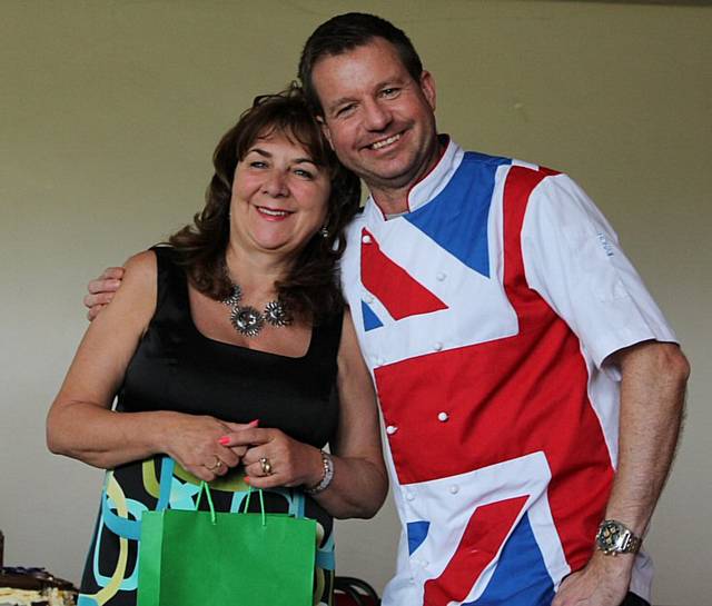 Littleborough Bake Off Winner of 5 prizes in 5 different categories Judith Parack with Judge Andrew Nutter