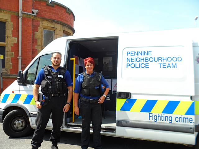 PCSOs Stefan Wilson and Stephanie Leigh outside the Co-Operative shop on Grosvenor Street, Castleton