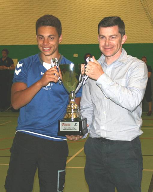 James Bennett receiving his Outstanding Academic Award with Dean Kimpton, Director at Sports4