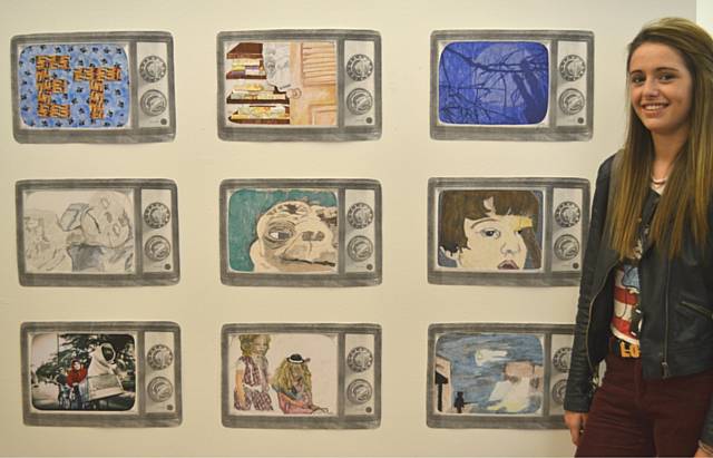 Morgan Fay pictured with her work inspired by the film ET
