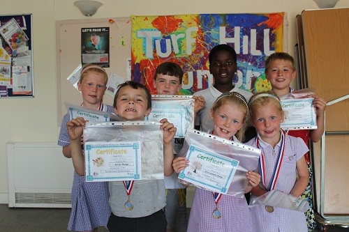 Turf Hill Junior Wardens show off their certificates