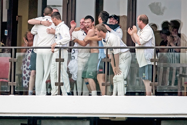 Rochdale celebrate victory on the balcony at Redbrook<br />Rochdale CC v Littleborough CC - Tom Hardman Cup Final