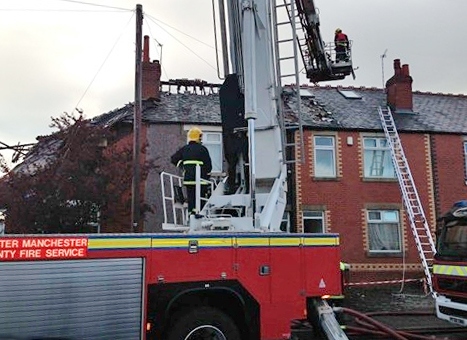 Crews were called to War Office Road at around 5.10am and found an end terraced property on fire and partially collapsed