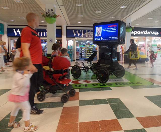 Mobile electronic screens in Rochdale's Exchange Shopping Centre