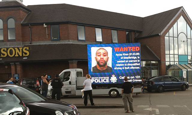 Mobile electronic screens in Morrisons car park in Rochdale