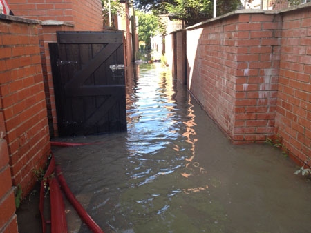 Around 12 homes on Entwistle Road have been affected by serious flooding 