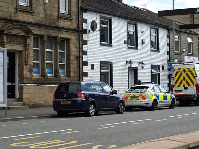 Emergency services attending suspicious package on Dale Street, Milnrow
