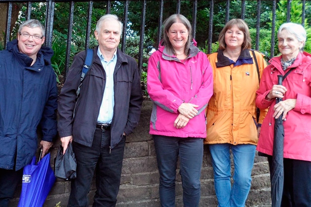 Tour guide Anne Thomas (far right) with visitors