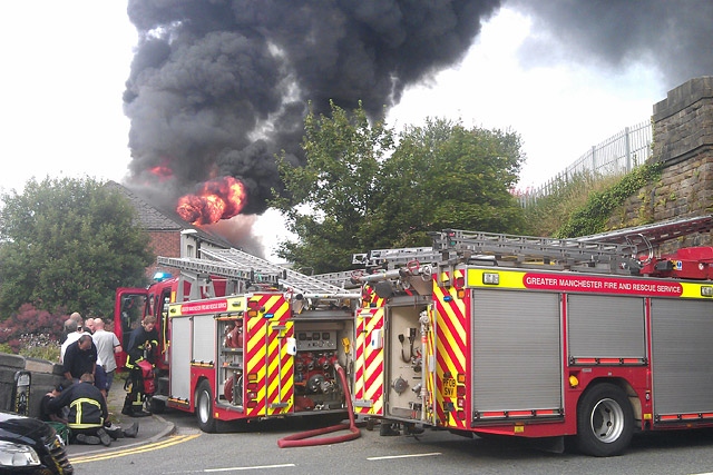 Fire fighters tackle a fire on Ebor Street, Littleborough