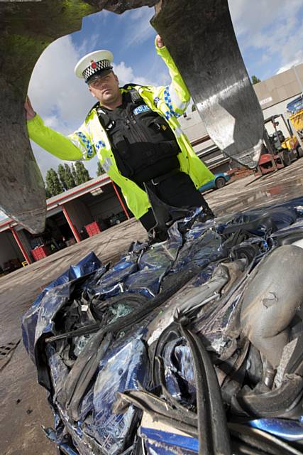 Crushed car, which was seized for having no tax and insurance