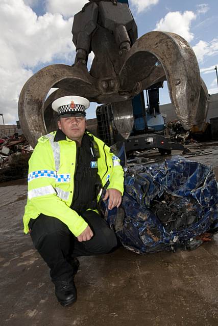 Crushed car, which was seized for having no tax and insurance