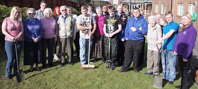 Emma McHale, left, with fellow Team members. The Team completed garden improvements at Arnold Bagnall Court residential home in Rochdale