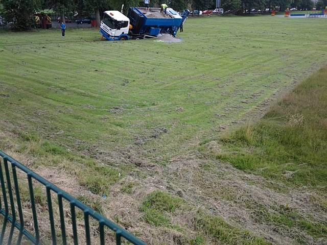 Truck sunk in school playing field