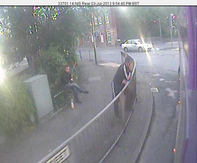 CCTV still of men wanted after woman had tooth knocked out during mugging
