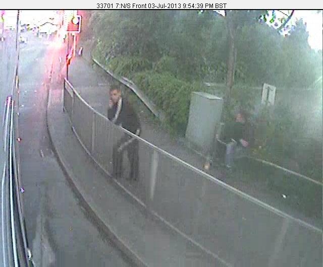 CCTV still of men wanted after woman had tooth knocked out during mugging
