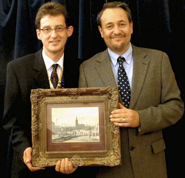 President Neil Helliwell and Nick Hall holding LS Lowry sketch