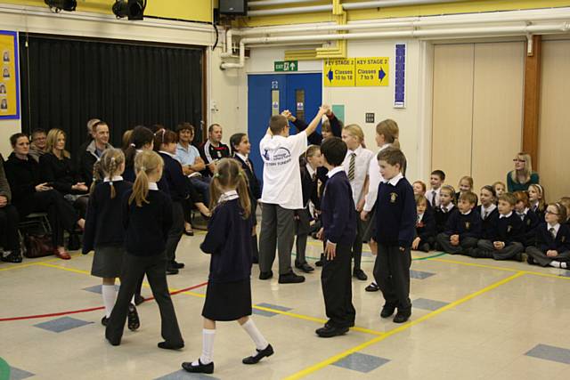 Children practising folk dance taught by the English Folk Dance and Song Society