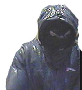 Masked raider who robbed Ladbrokes on The Strand