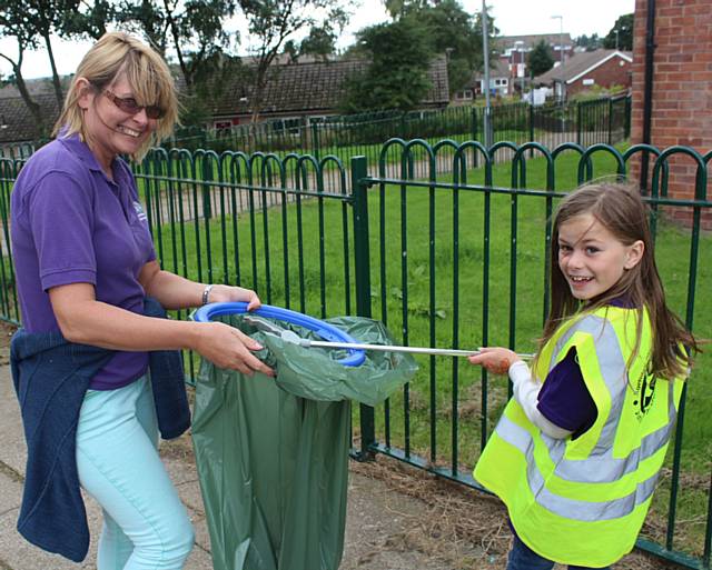 RBH Director of Resources, Nickie Hallard, helps out with the litter pick in Smallbridge