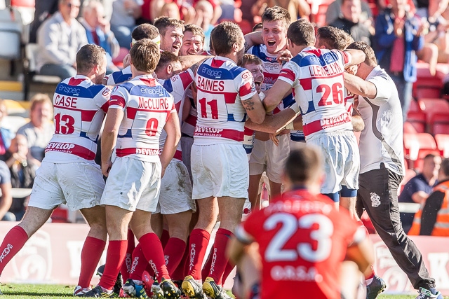 The hooter goes and the Hornets players celebrate