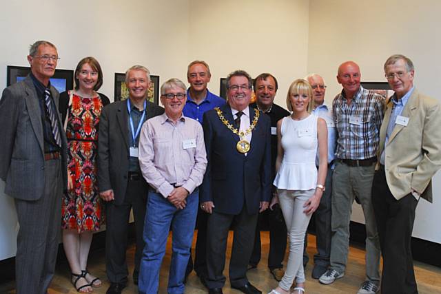 Photography students with John Spindler, Hopwood Hall College’s Deputy Principal (3rd from left); Paul Butcher, Hopwood Hall College tutor (4th from left) and the Mayor of Rochdale, Councillor Peter Rush (centre)