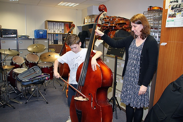 Rochdale Music Service Open Day<br /> Jack Davies tries the Double Bass