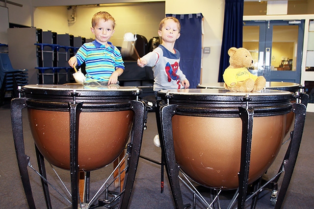 Rochdale Music Service Open Day<br /> Daniel and Thomas Wild with Yellow Bear trying the drums