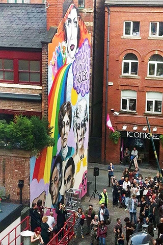 The mural being revealed to the public