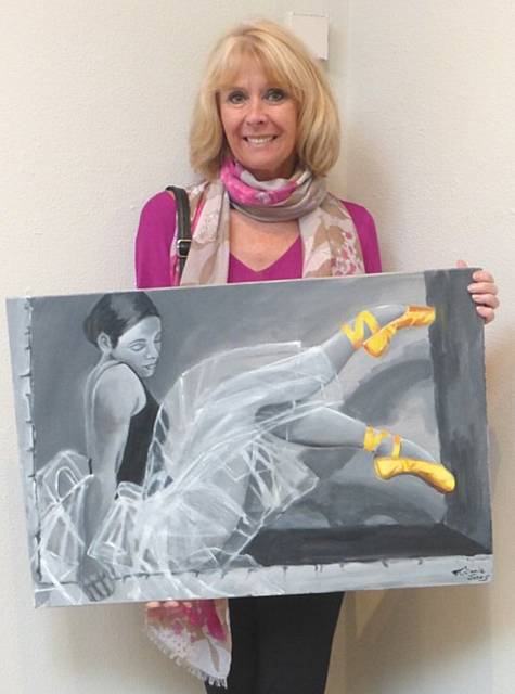 Stephanie Jones and her painting - ‘Ballerina with Yellow Shoes’ 
