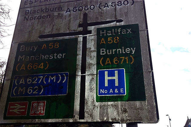 The filthy road sign in Rochdale Town Centre